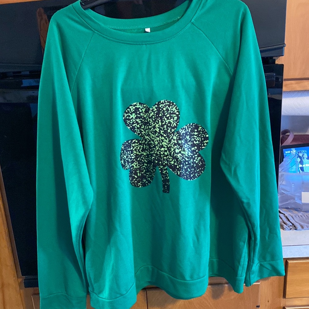 Green st Patrick’s day shirt. Brand new never worn.  Size 2XL
